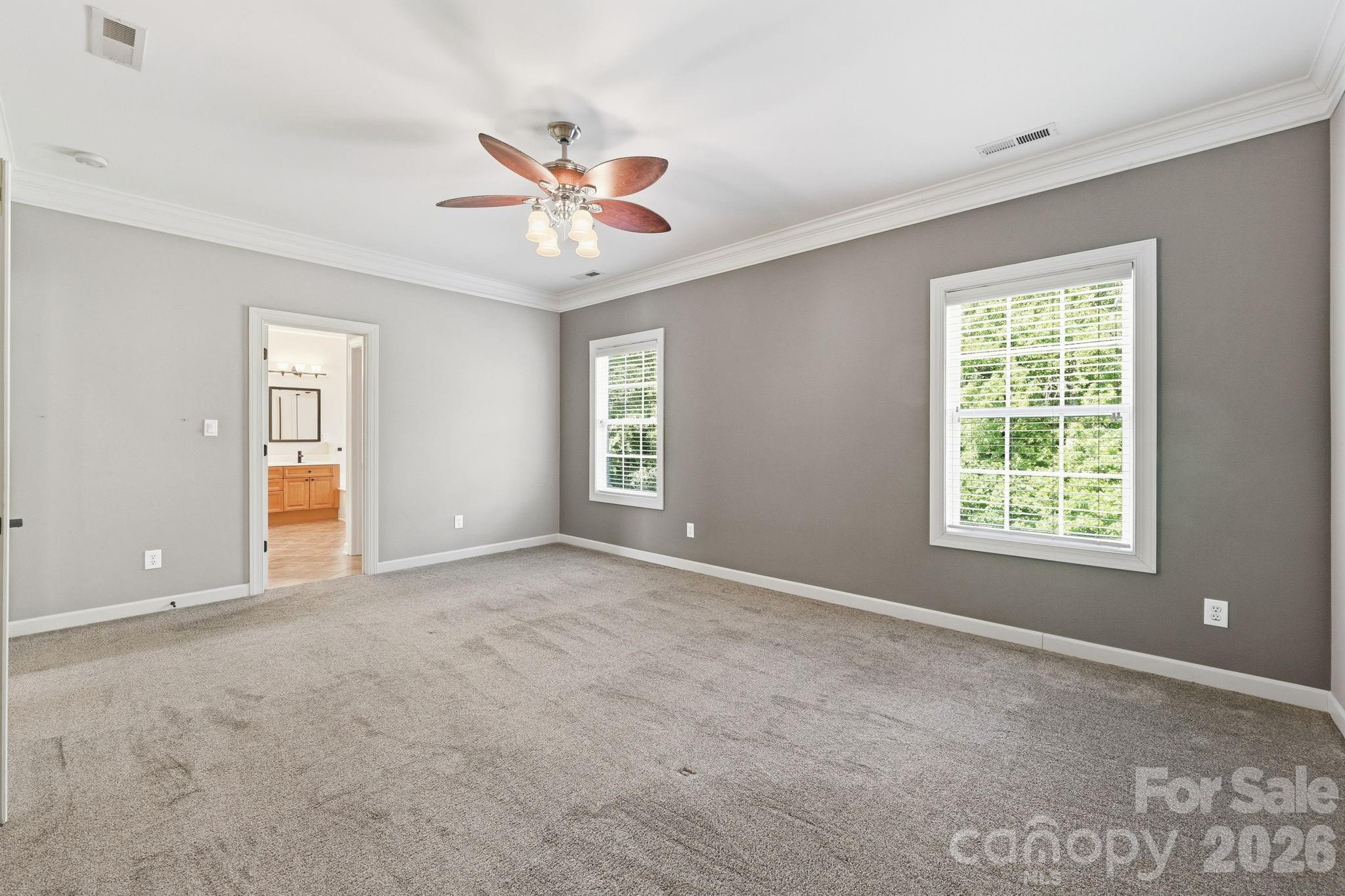 3308 Grandeur Road Charlotte, NC 28269 - Photo 19 of 45 a view of an empty room with a window