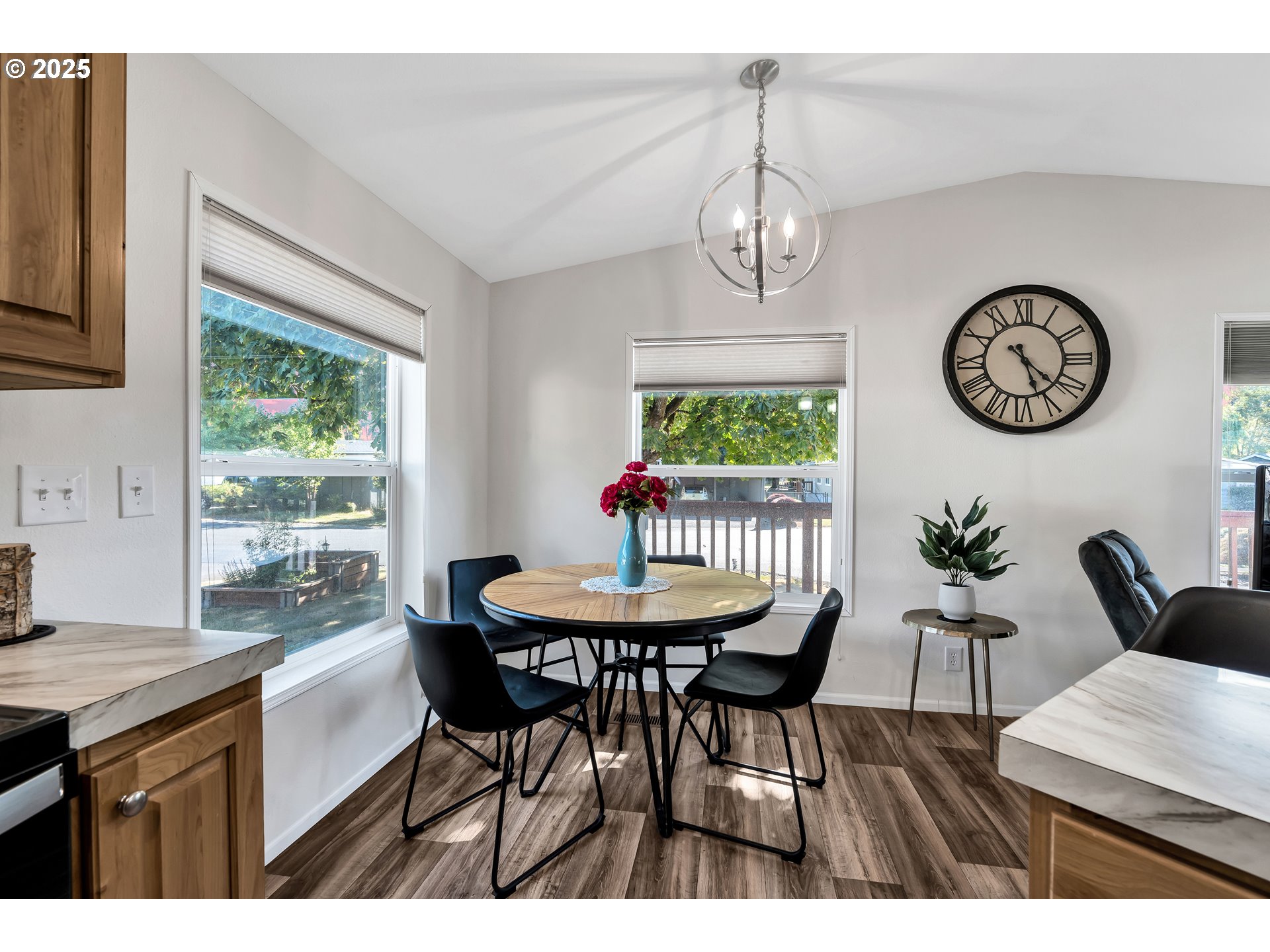 4915 Swegle Road Northeast, Unit 63 Salem, OR 97301 - Photo 10 of 36 a view of a dining room with furniture window and outside view