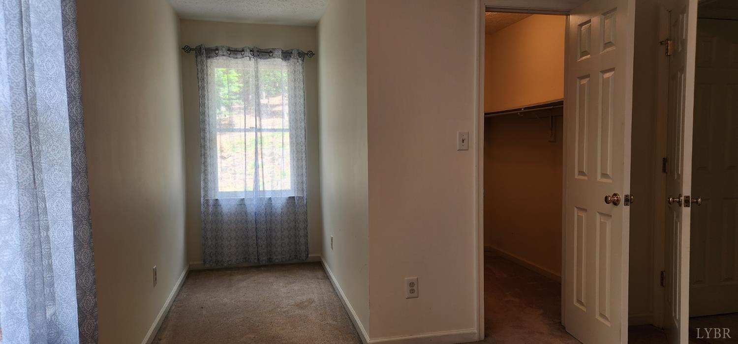297 Poor House Farm Road Amherst, VA 24521 - Photo 36 of 52 a view of a hallway with wooden floor