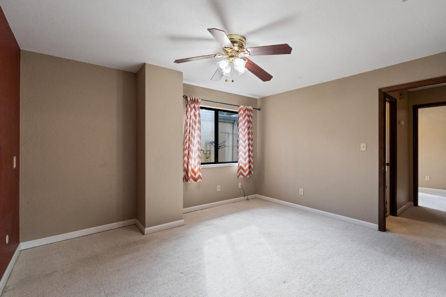 2418 P Street, Unit F Sacramento, CA 95816 - Photo 19 of 31 a view of an empty room with a window