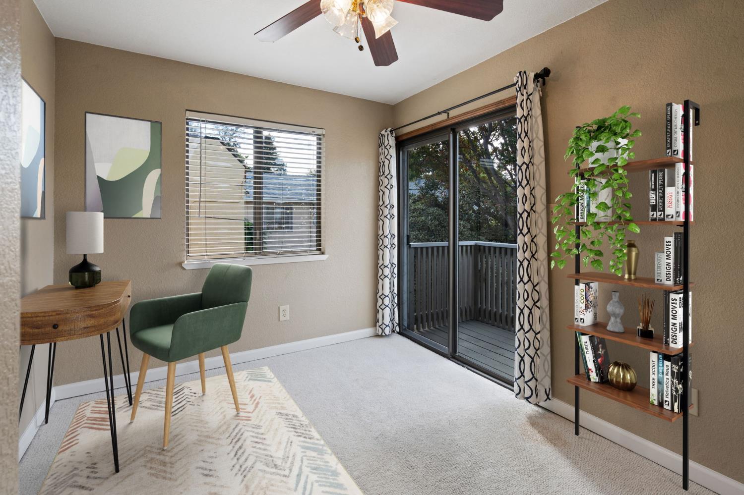 2418 P Street, Unit F Sacramento, CA 95816 - Photo 22 of 31 a living room with furniture and a window