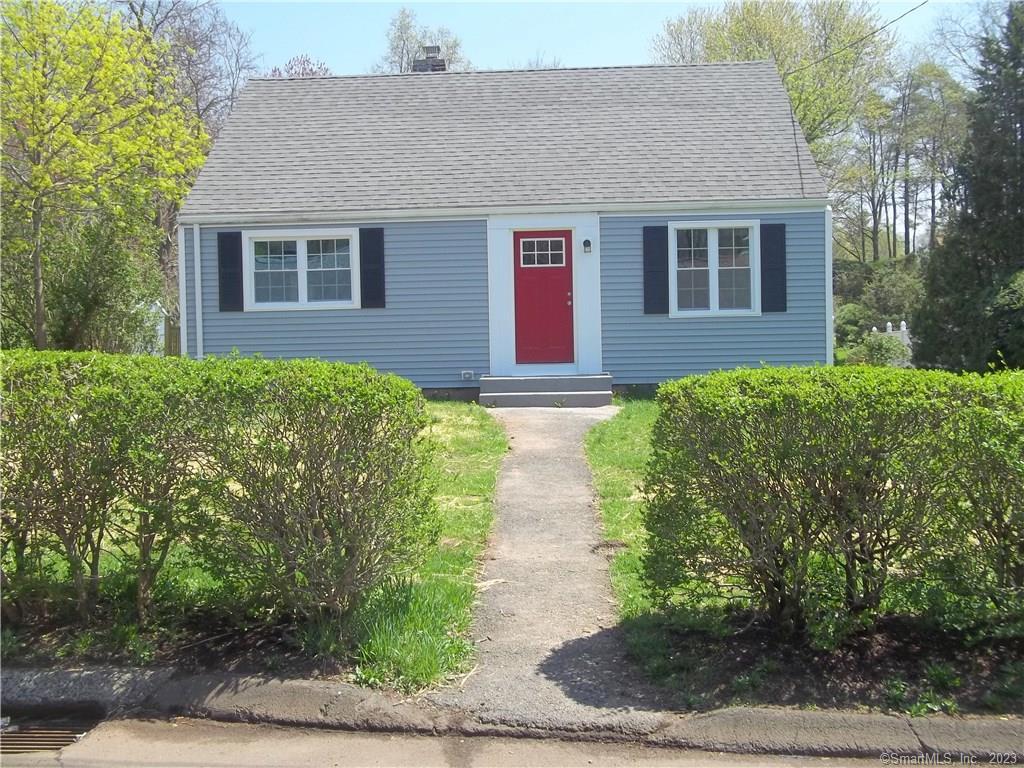 73 Tremper Drive Wallingford, CT 06492 - Photo 1 of 1 a front view of a house with garden