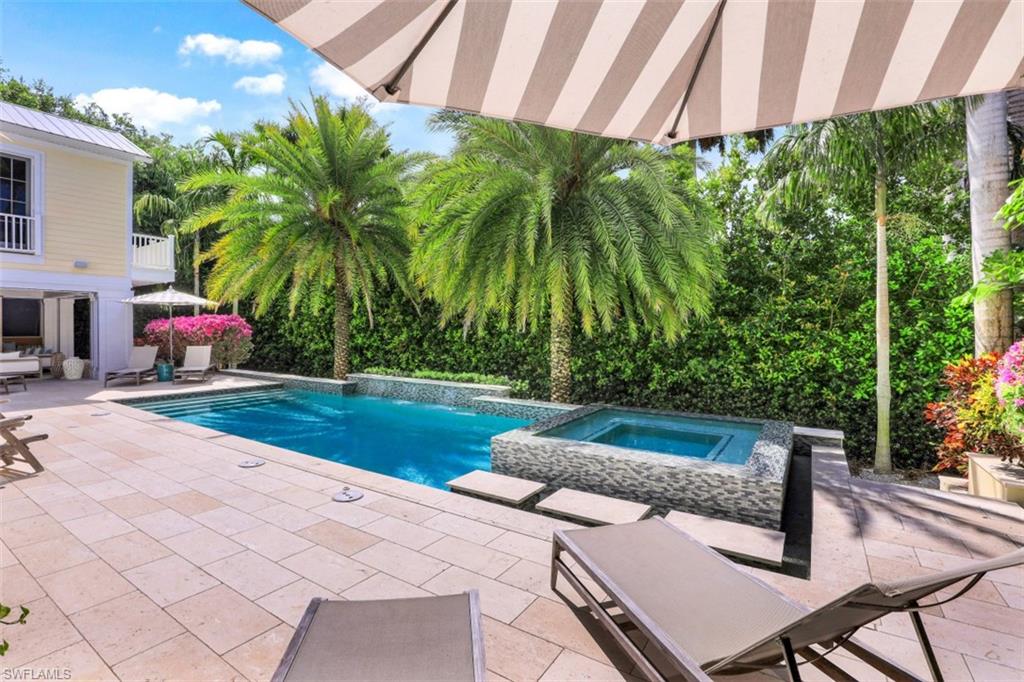 154 4th Avenue North Naples, FL 34102 - Photo 45 of 50 a outdoor view with a sitting space