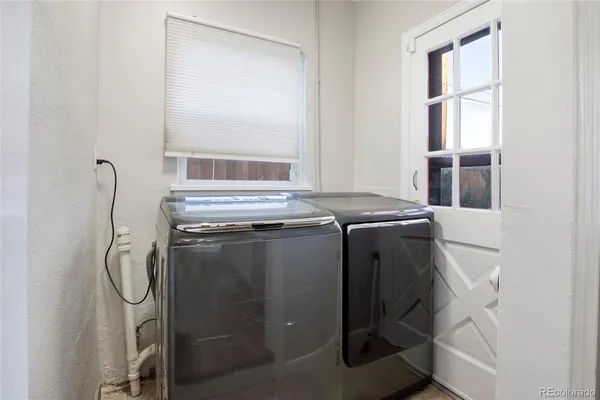 a utility room with dryer and washer