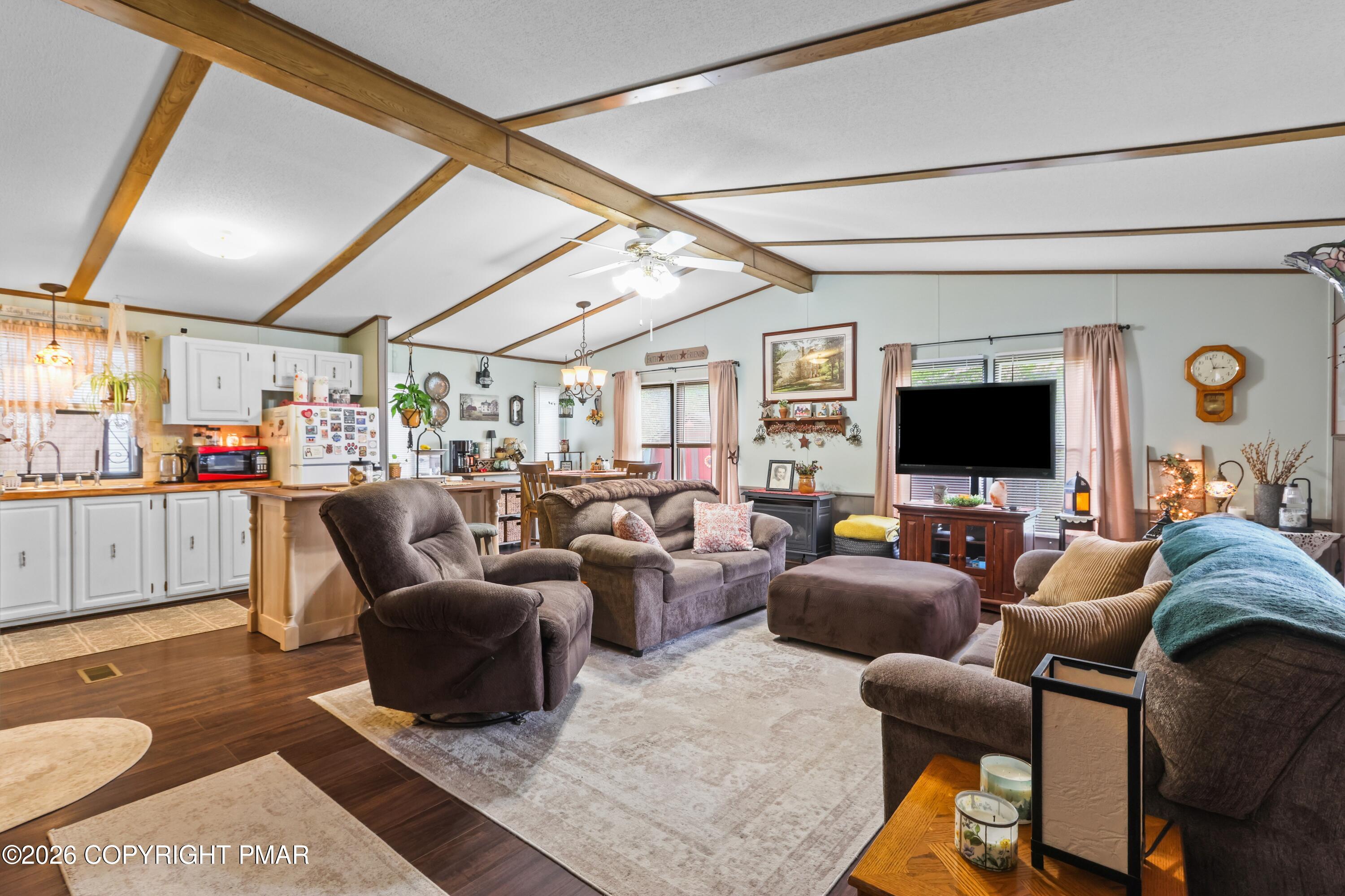 17 Valley View Drive Bath, PA 18014 - Photo 6 of 34 a living room with furniture a flat screen tv and kitchen view