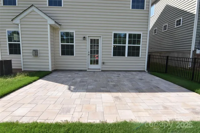 a front view of a house with garage