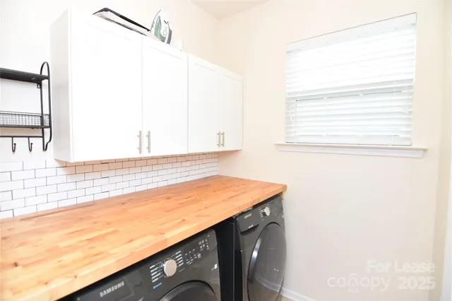 a view of a kitchen with a sink