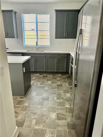a bathroom with a sink a vanity and a mirror