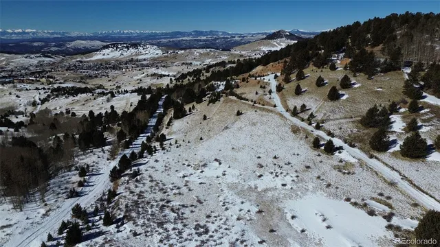 a view of a backyard of the house