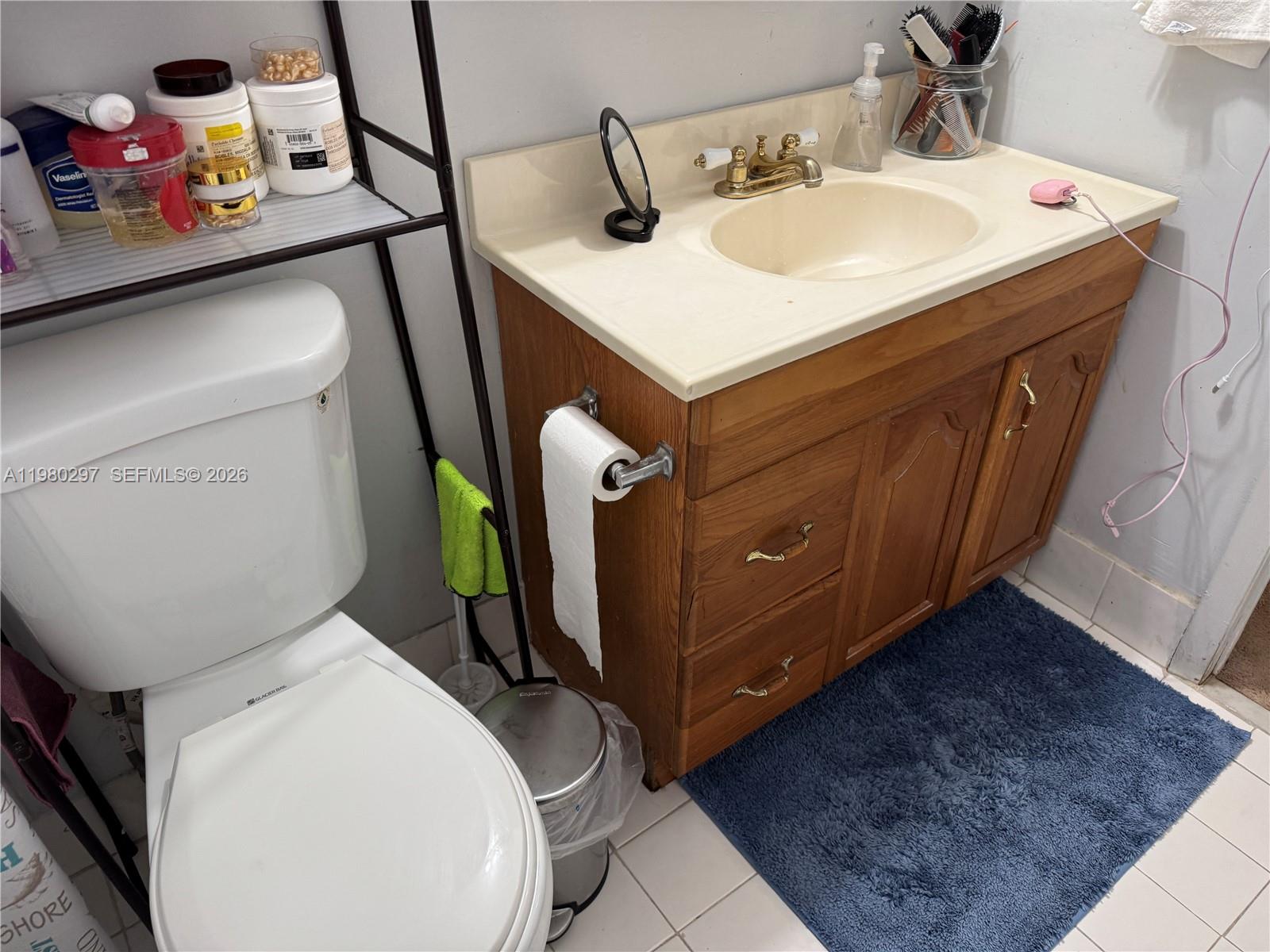 6507 Winfield Boulevard, Unit 111AC Margate, FL 33063 - Photo 30 of 42 a utility room with dryer and washer
