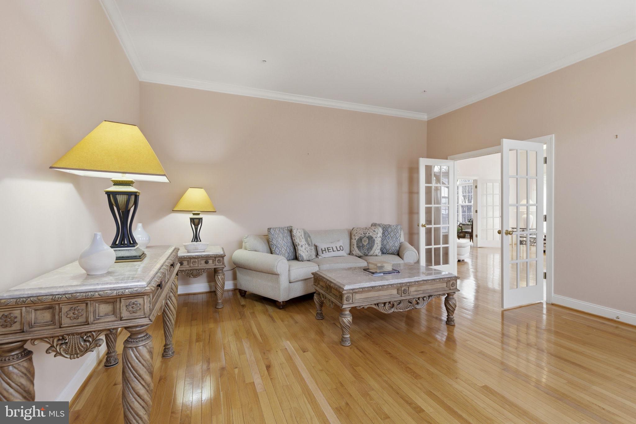 15611 Riding Stable Road Laurel, MD 20707 - Photo 11 of 86 a living room with furniture and a table