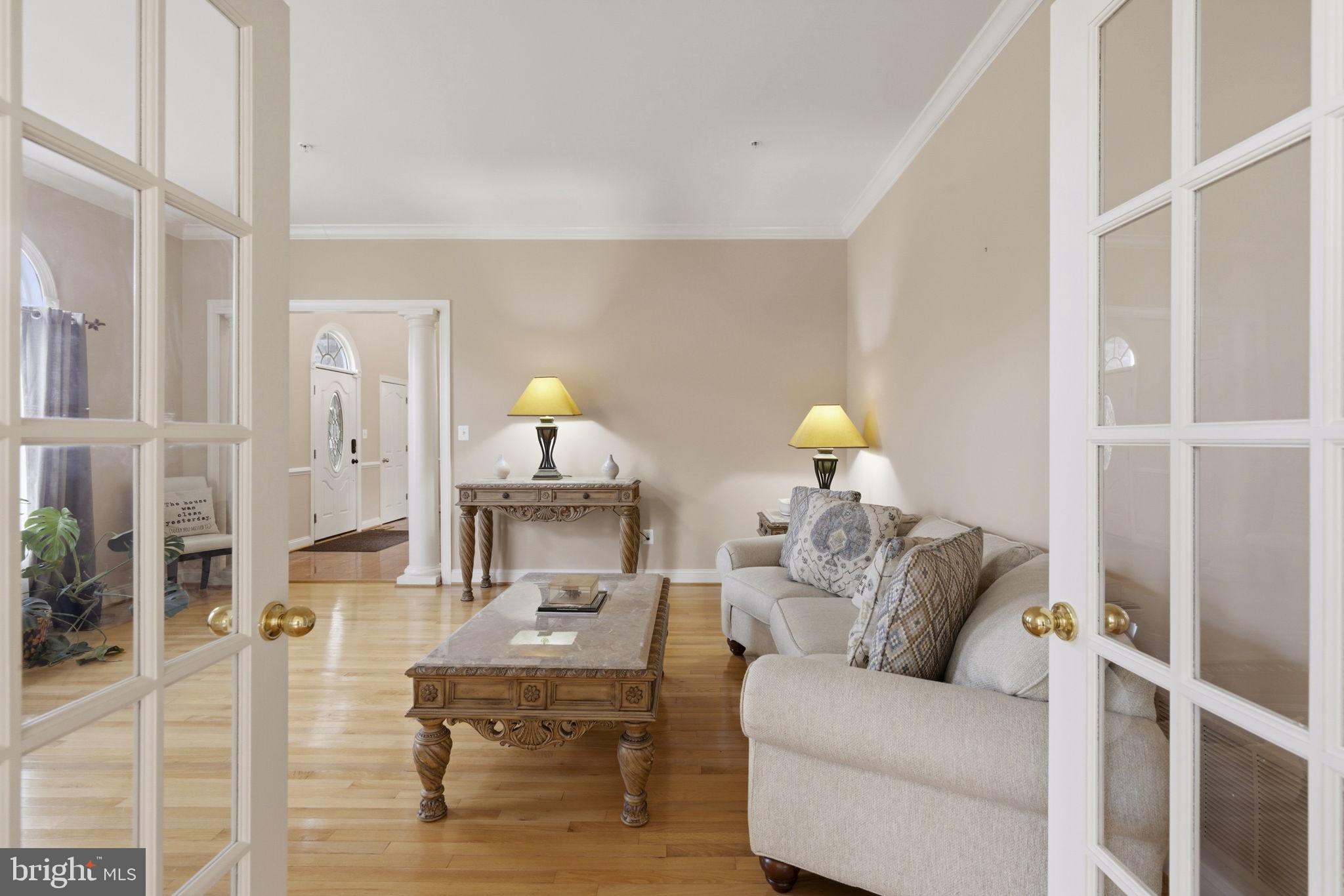 15611 Riding Stable Road Laurel, MD 20707 - Photo 12 of 86 Elegant living space with detailed molding