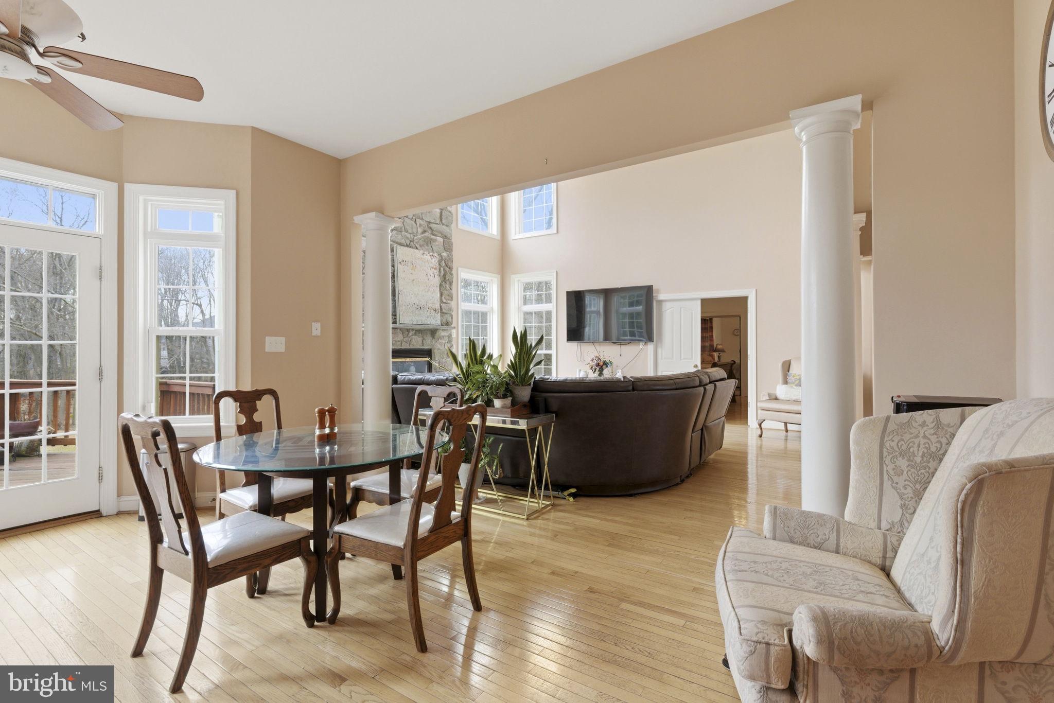 15611 Riding Stable Road Laurel, MD 20707 - Photo 29 of 86 a view of a dining room with furniture and windows