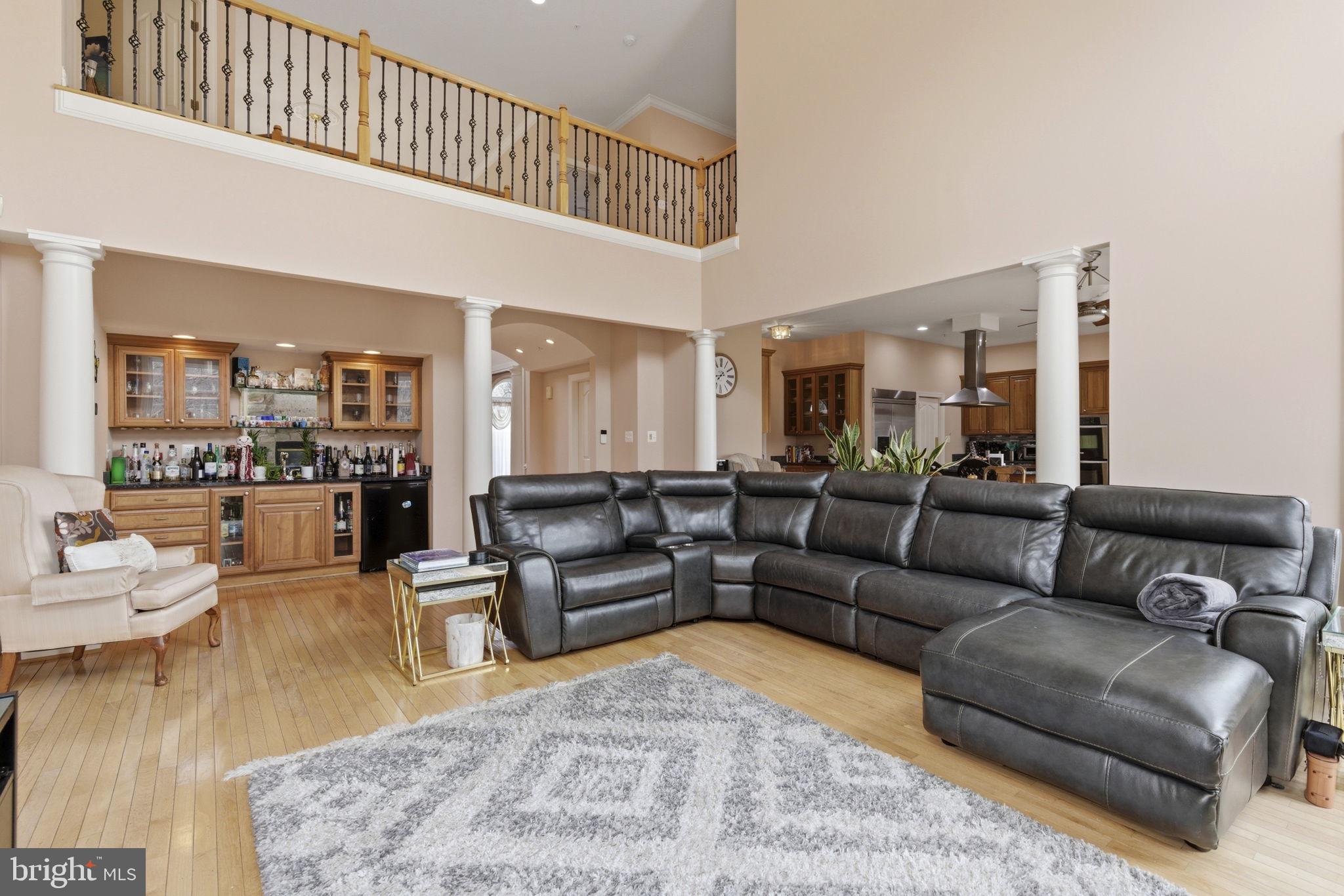 15611 Riding Stable Road Laurel, MD 20707 - Photo 33 of 86 a living room with furniture wooden floor and a large window