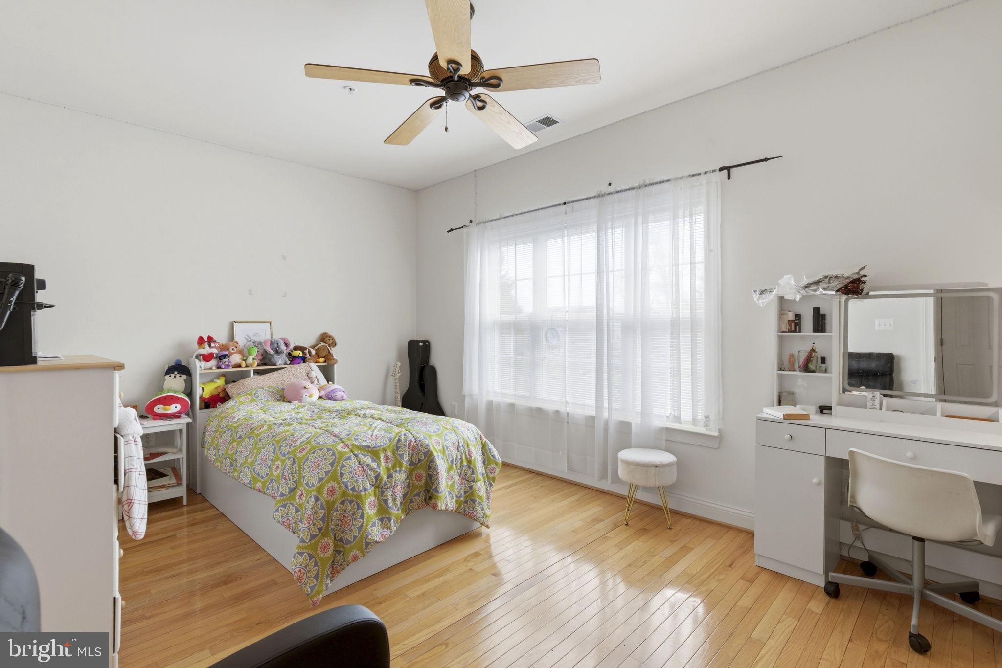 15611 Riding Stable Road Laurel, MD 20707 - Photo 54 of 86 Bedroom 4 w/double window, hardwood & ceiling fan