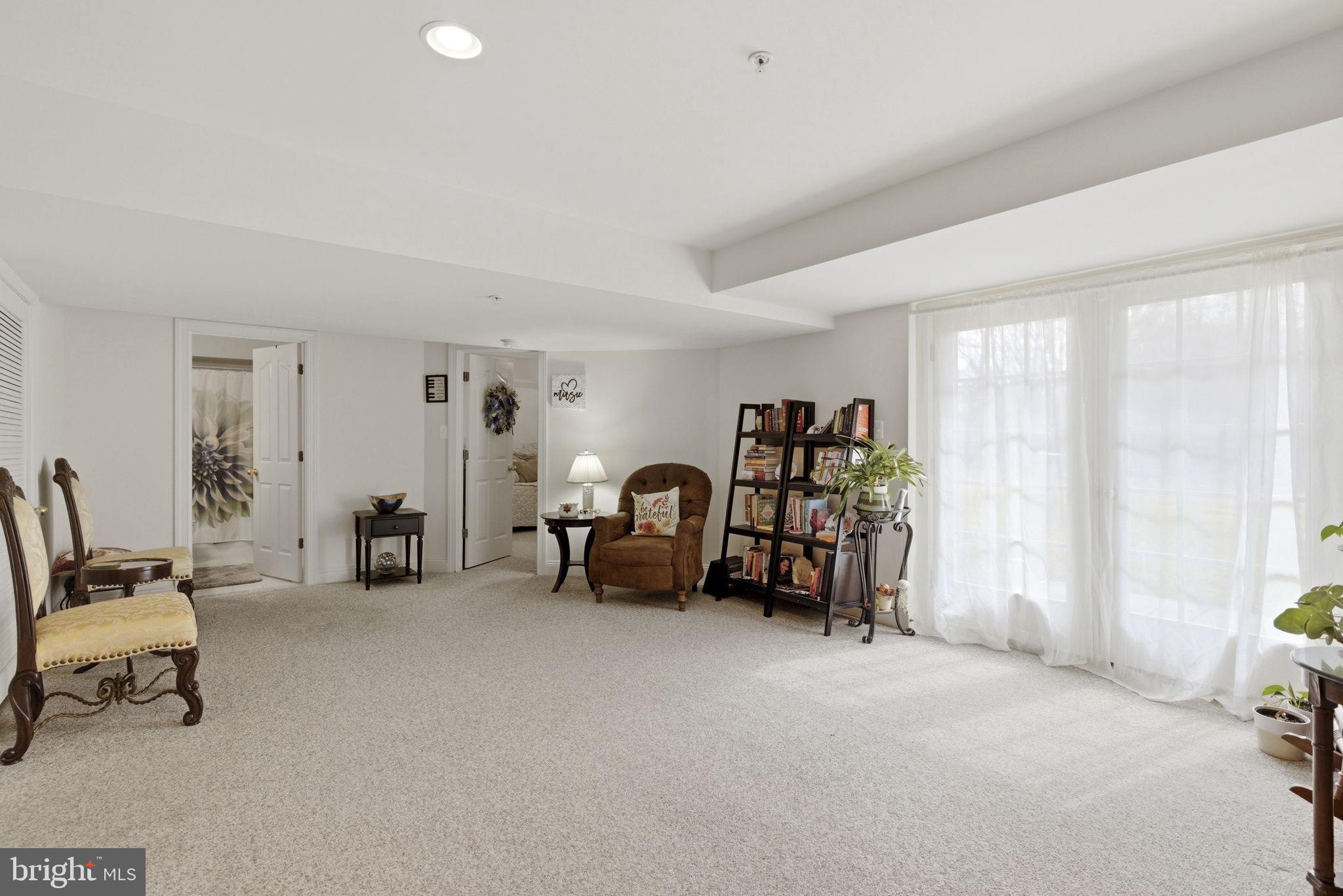 15611 Riding Stable Road Laurel, MD 20707 - Photo 68 of 86 Large family rec room with extra storage nearby