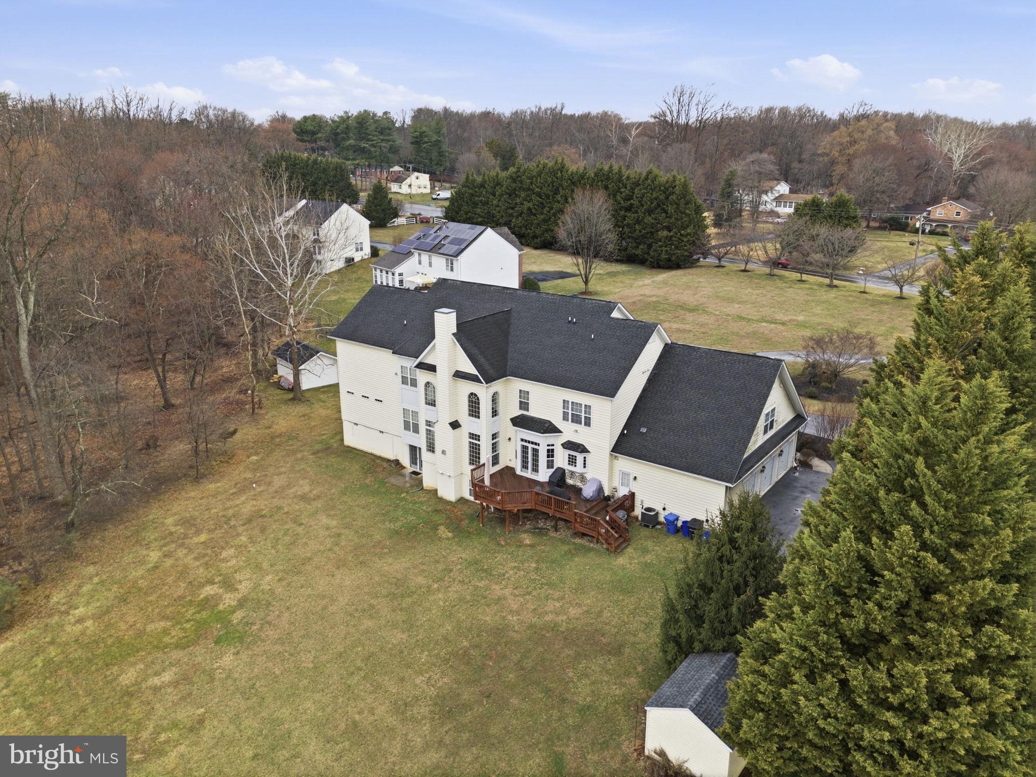 15611 Riding Stable Road Laurel, MD 20707 - Photo 78 of 86 an aerial view of a house with a garden