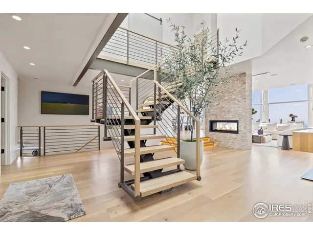 a view of entryway livingroom and hall