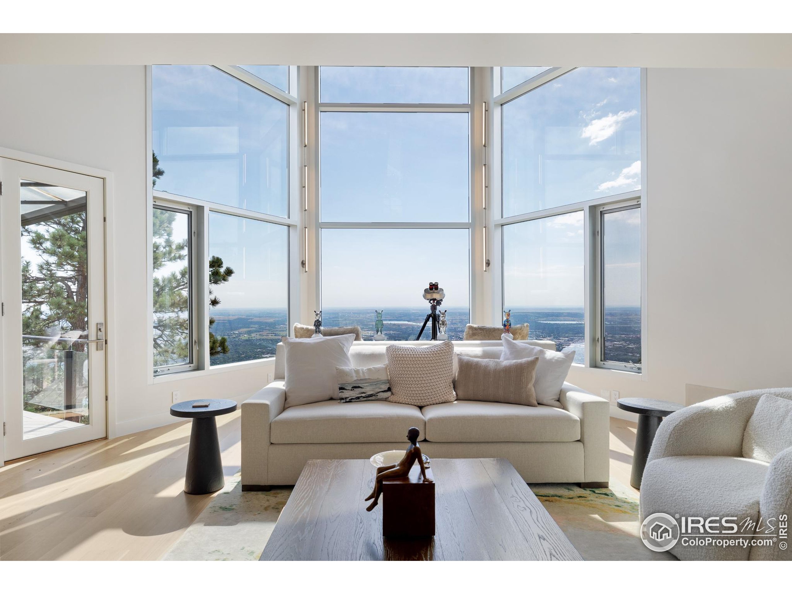 1145 Timber Lane Boulder, CO 80304 - Photo 5 of 40 a living room with furniture and a large window