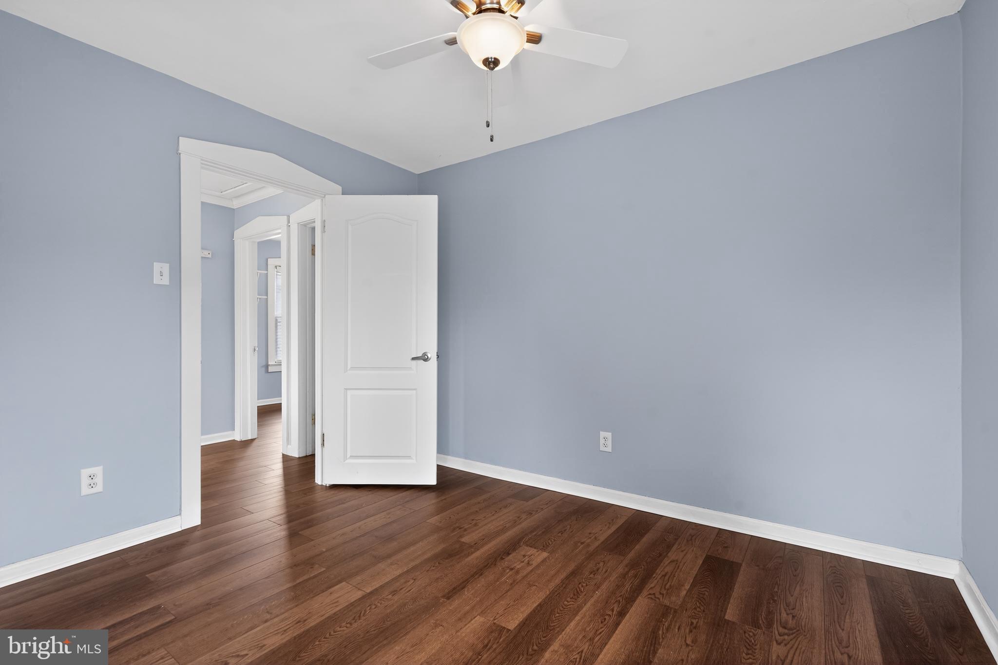 106 Ford Street Voorhees, NJ 08043 - Photo 22 of 36 a view of an empty room with wooden floor