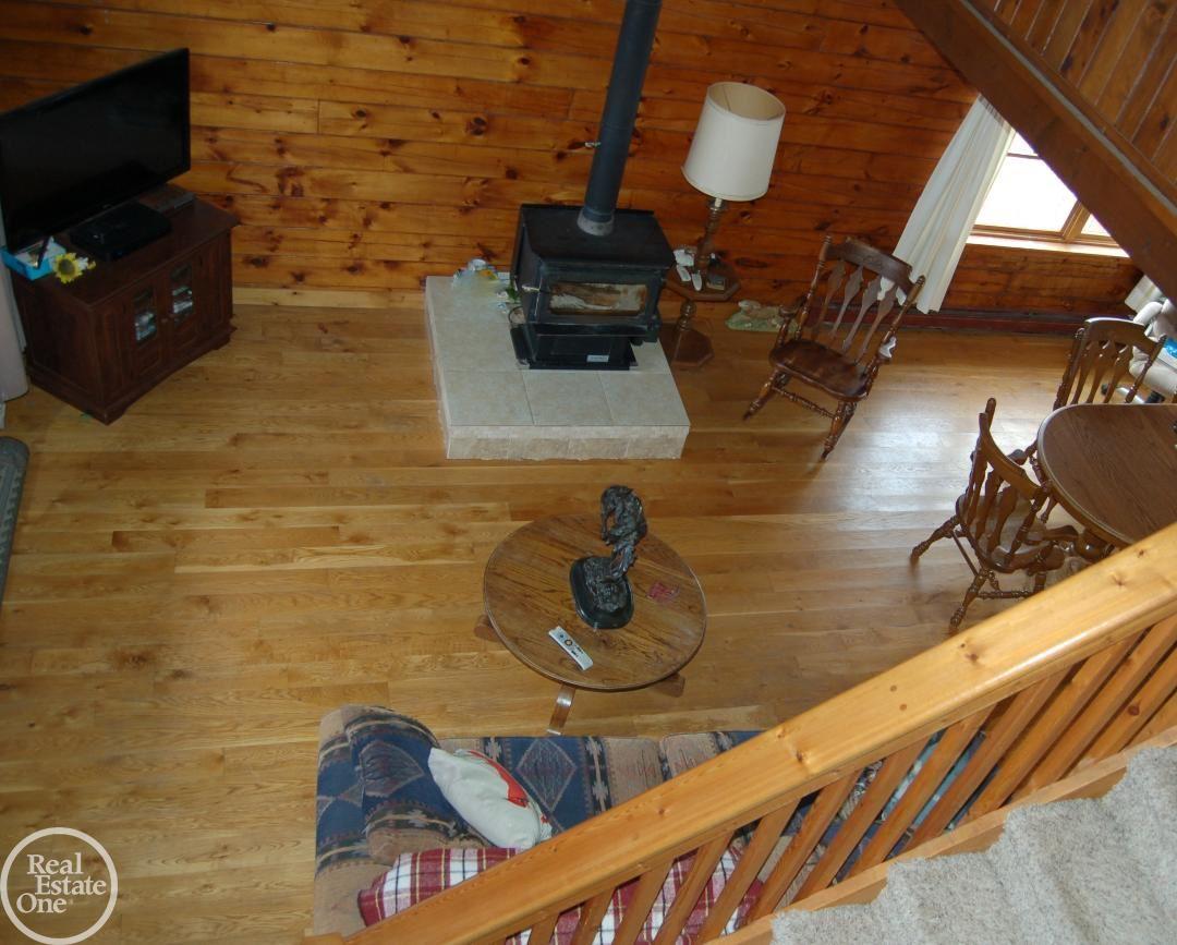 3580 Howland Road Almont, MI 48003 - Photo 8 of 38 Overlooking the great room. Air-tight wood-burnin g stove
