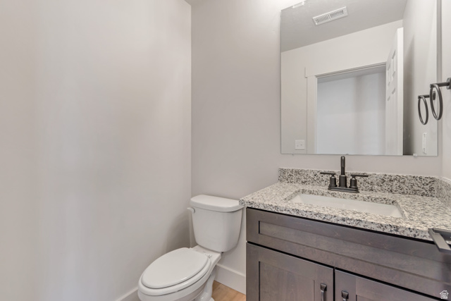 2535 West Santa Fe Drive Mapleton, UT 84664 - Photo 11 of 26 Half bathroom featuring vanity and toilet