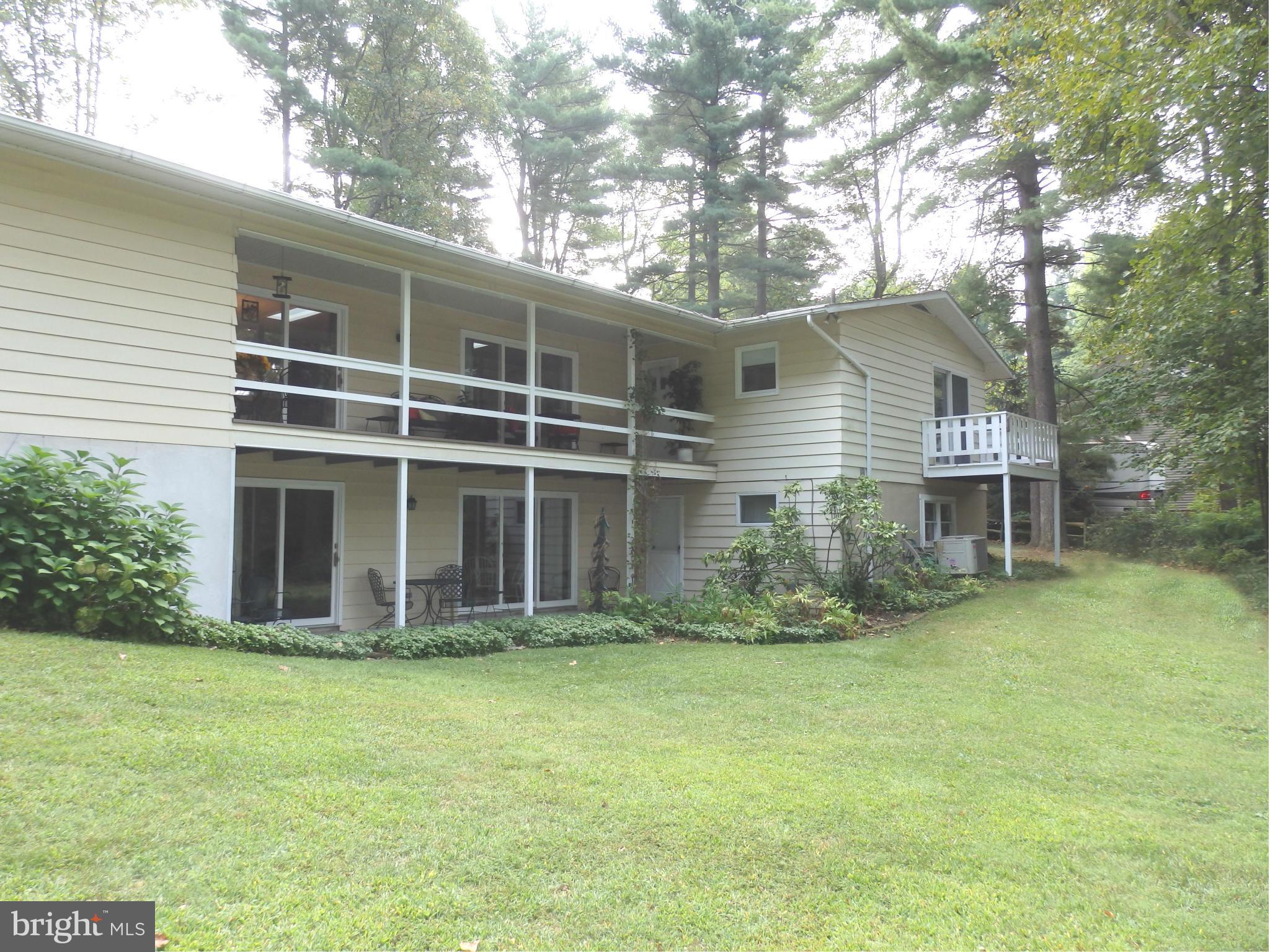 5512 Woodlyn Road Frederick, MD 21703 - Photo 20 of 30 View of balconies and patio from back yard