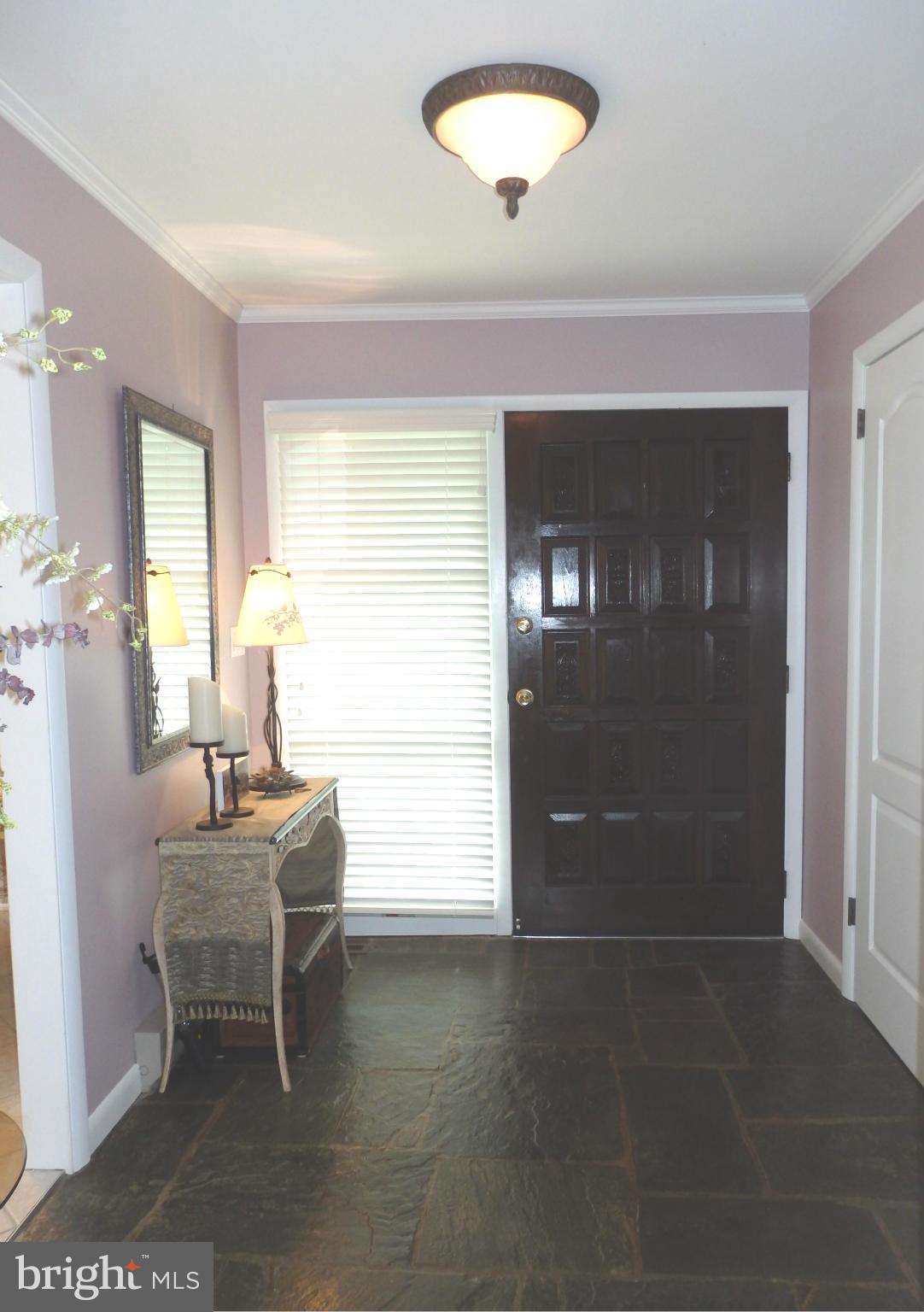 5512 Woodlyn Road Frederick, MD 21703 - Photo 3 of 30 Slate foyer has door with large sidelight