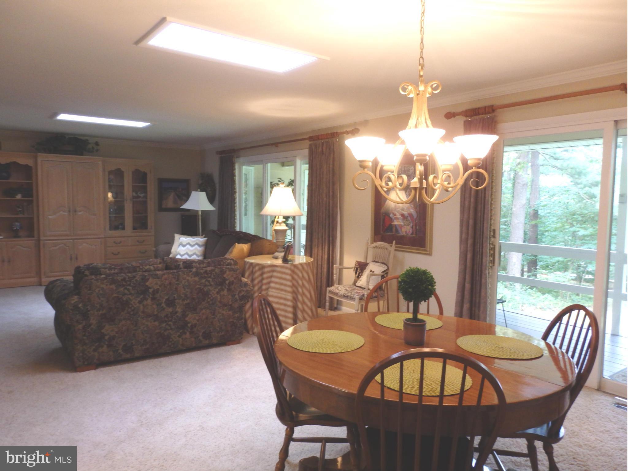 5512 Woodlyn Road Frederick, MD 21703 - Photo 10 of 30 Living/dining rooms have view of back yard