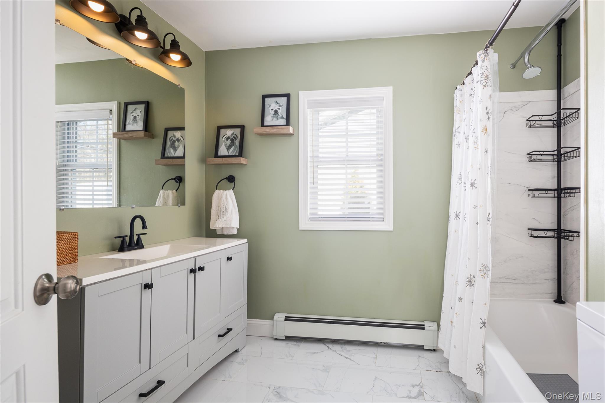3 Cedar Road Sound Beach, NY 11789 - Photo 8 of 14 a spacious bathroom with a double vanity sink a mirror and shower