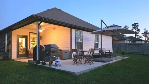a view of a swimming pool and an outdoor space