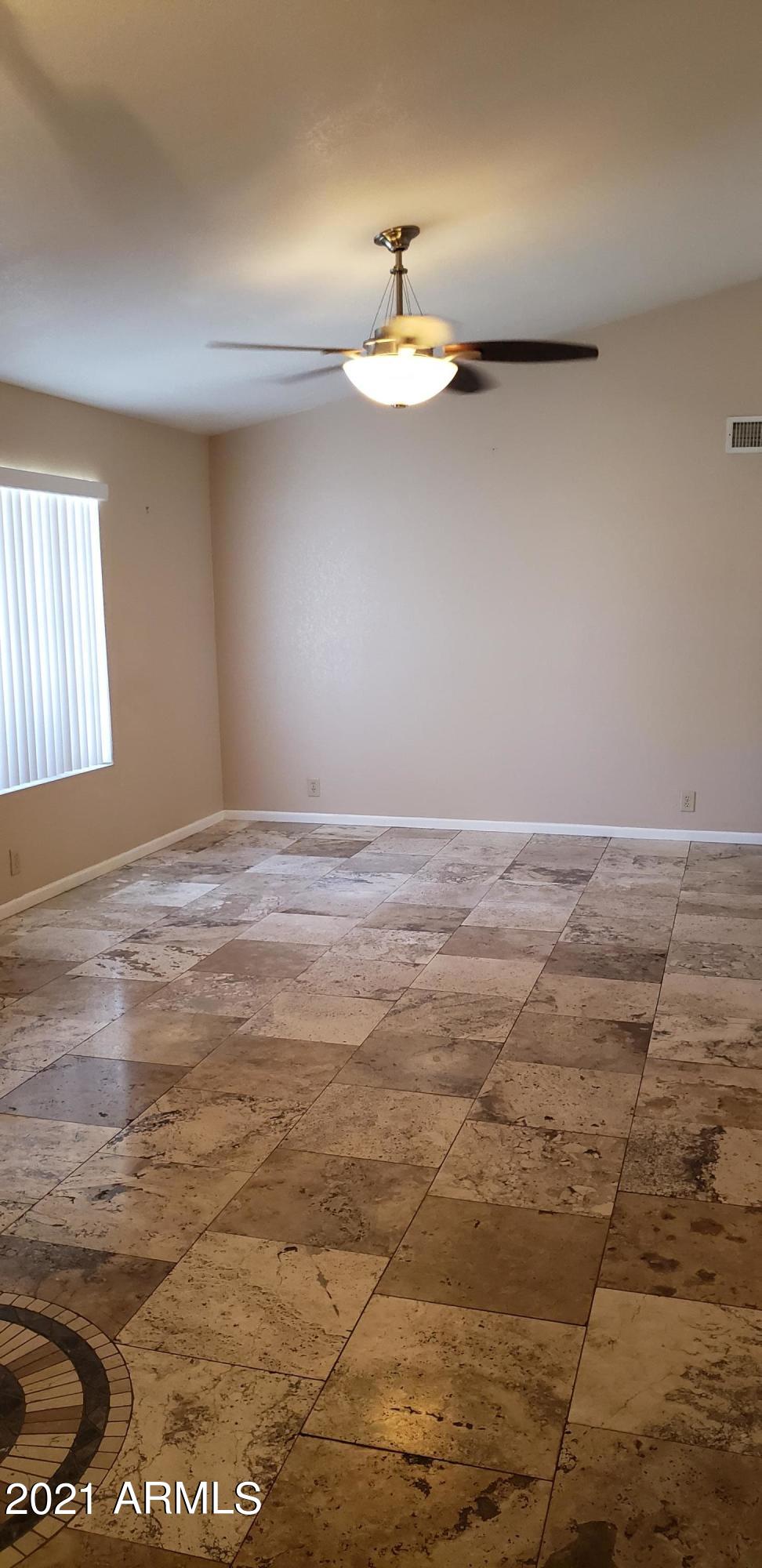 8739 West Wethersfield Road Peoria, AZ 85381 - Photo 5 of 42 20210506_133217