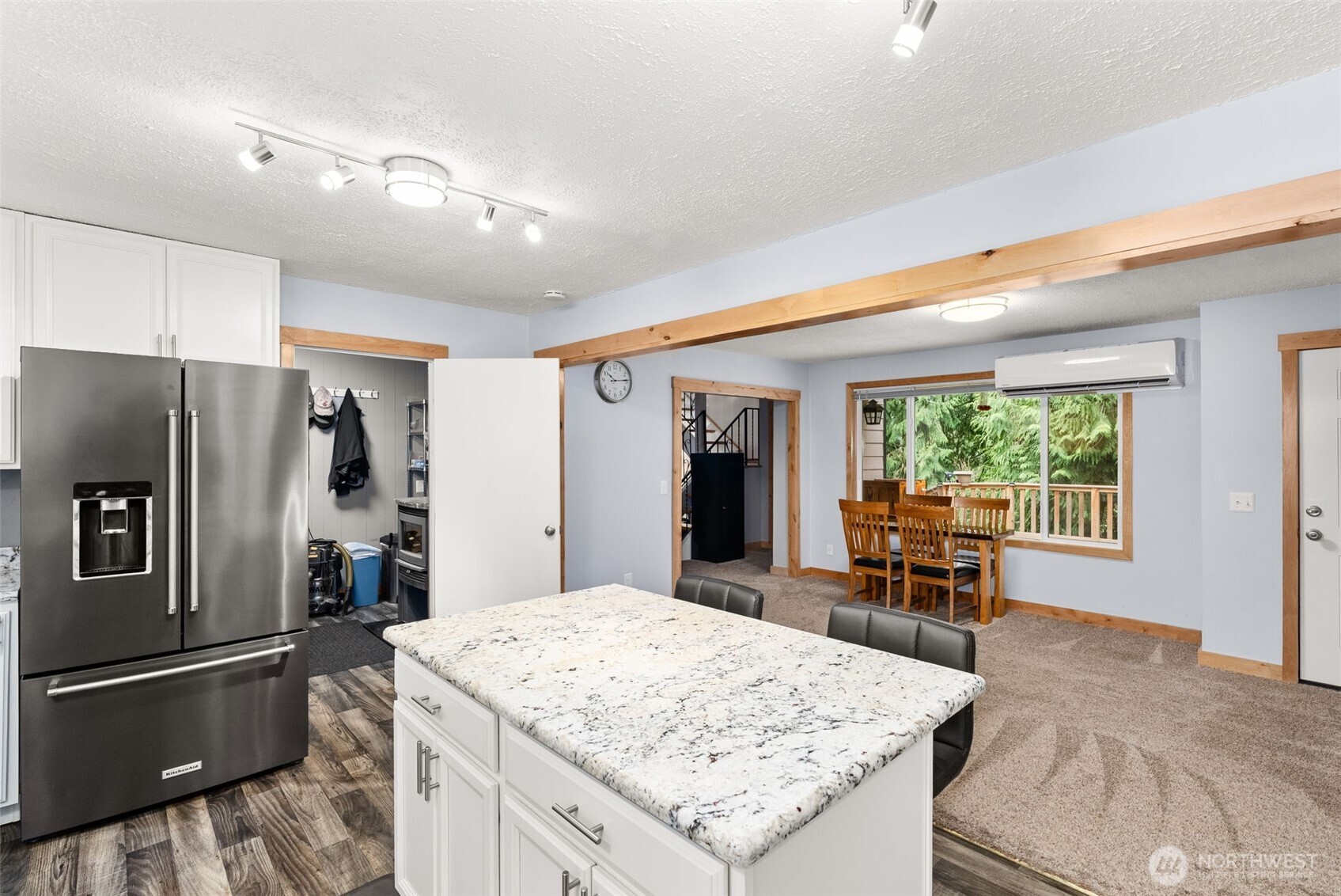 2434 Salzer Valley Road Centralia, WA 98531 - Photo 15 of 39 a kitchen with stainless steel appliances granite countertop table chairs and a refrigerator