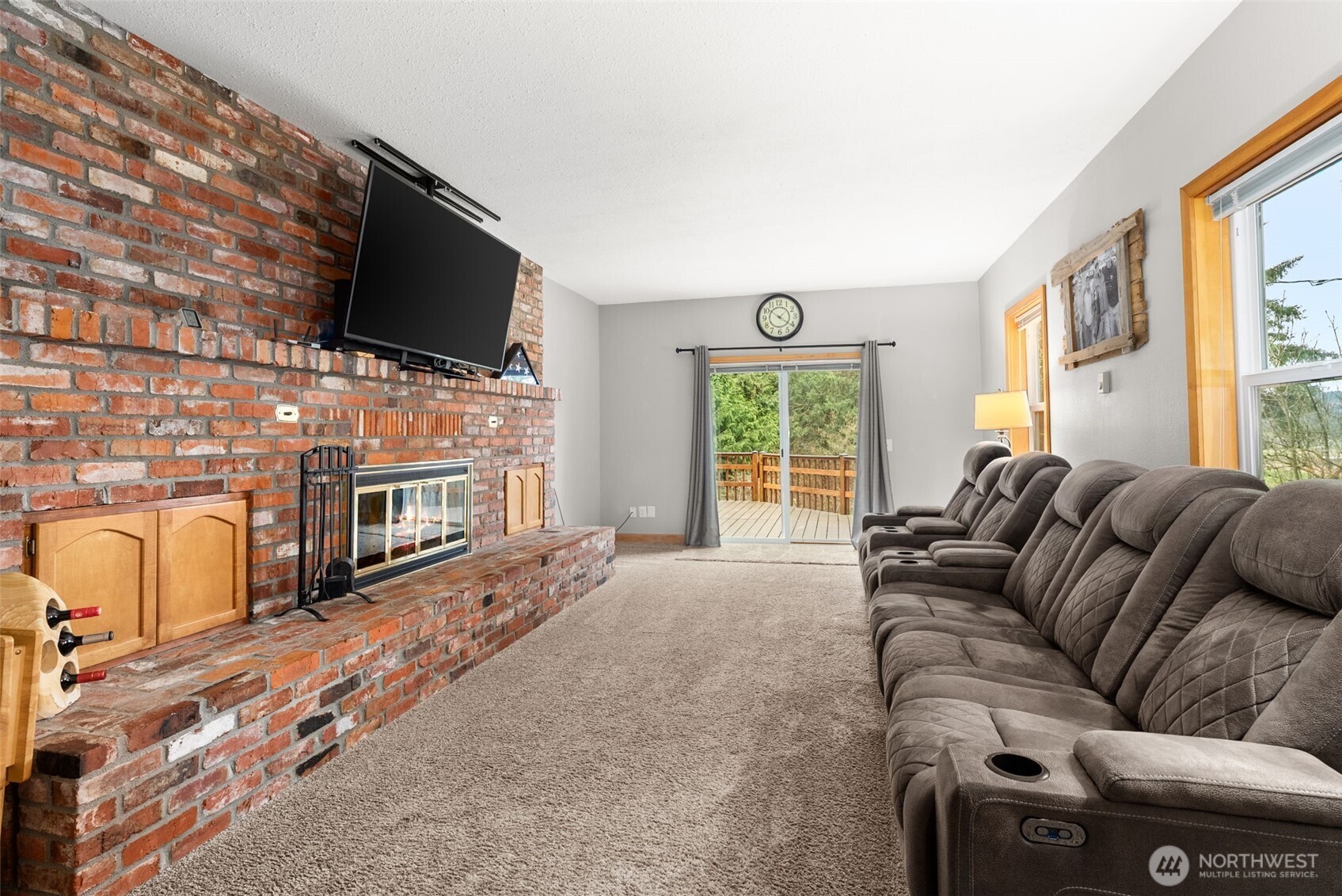 2434 Salzer Valley Road Centralia, WA 98531 - Photo 16 of 39 a living room with furniture and a flat screen tv