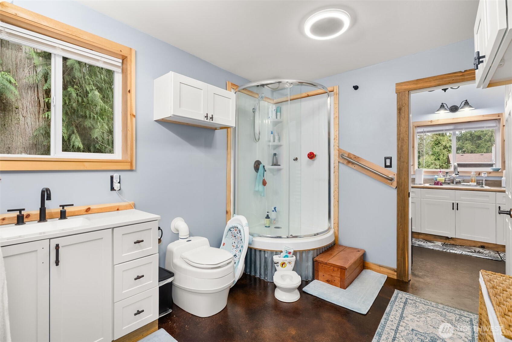 2434 Salzer Valley Road Centralia, WA 98531 - Photo 31 of 39 a spacious bathroom with a double vanity sink a toilet and a window