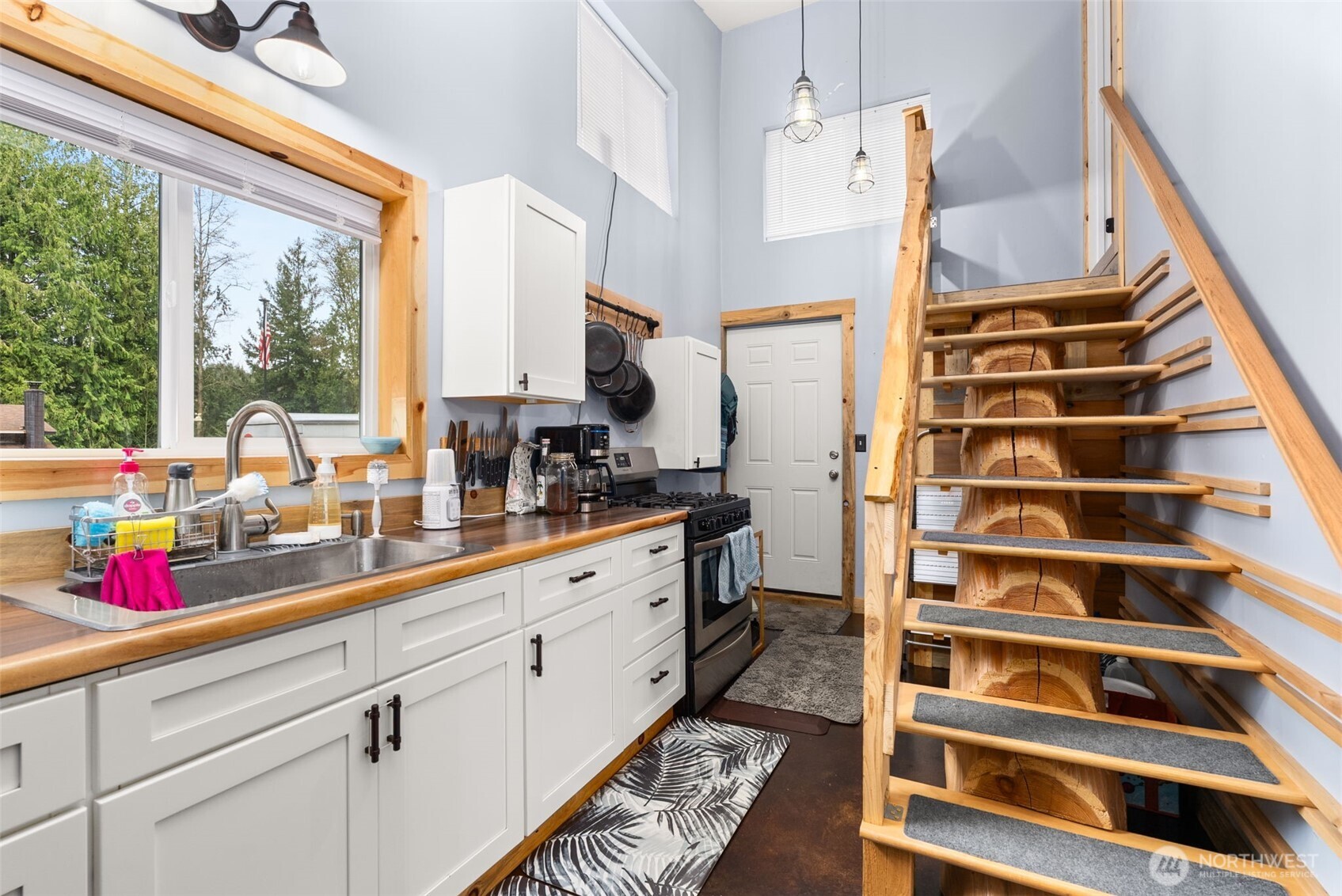 2434 Salzer Valley Road Centralia, WA 98531 - Photo 32 of 39 a kitchen with a refrigerator and a sink