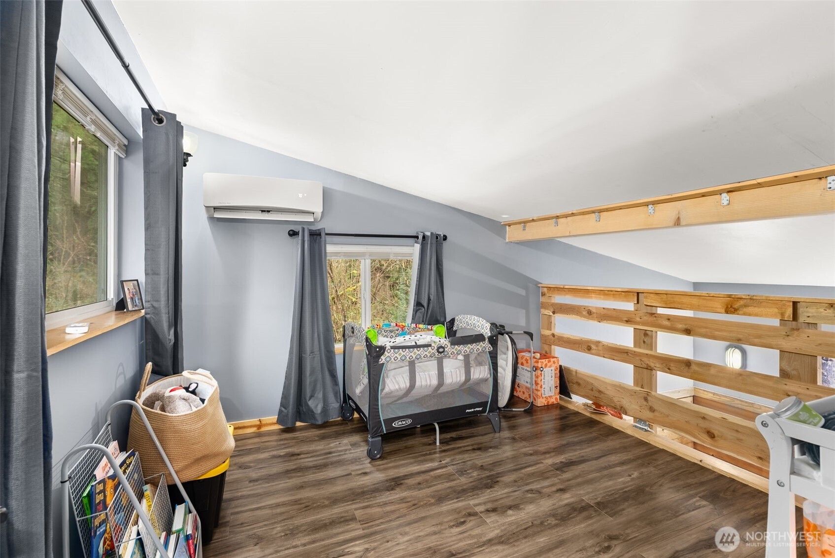 2434 Salzer Valley Road Centralia, WA 98531 - Photo 34 of 39 a living room with a bed furniture and a window