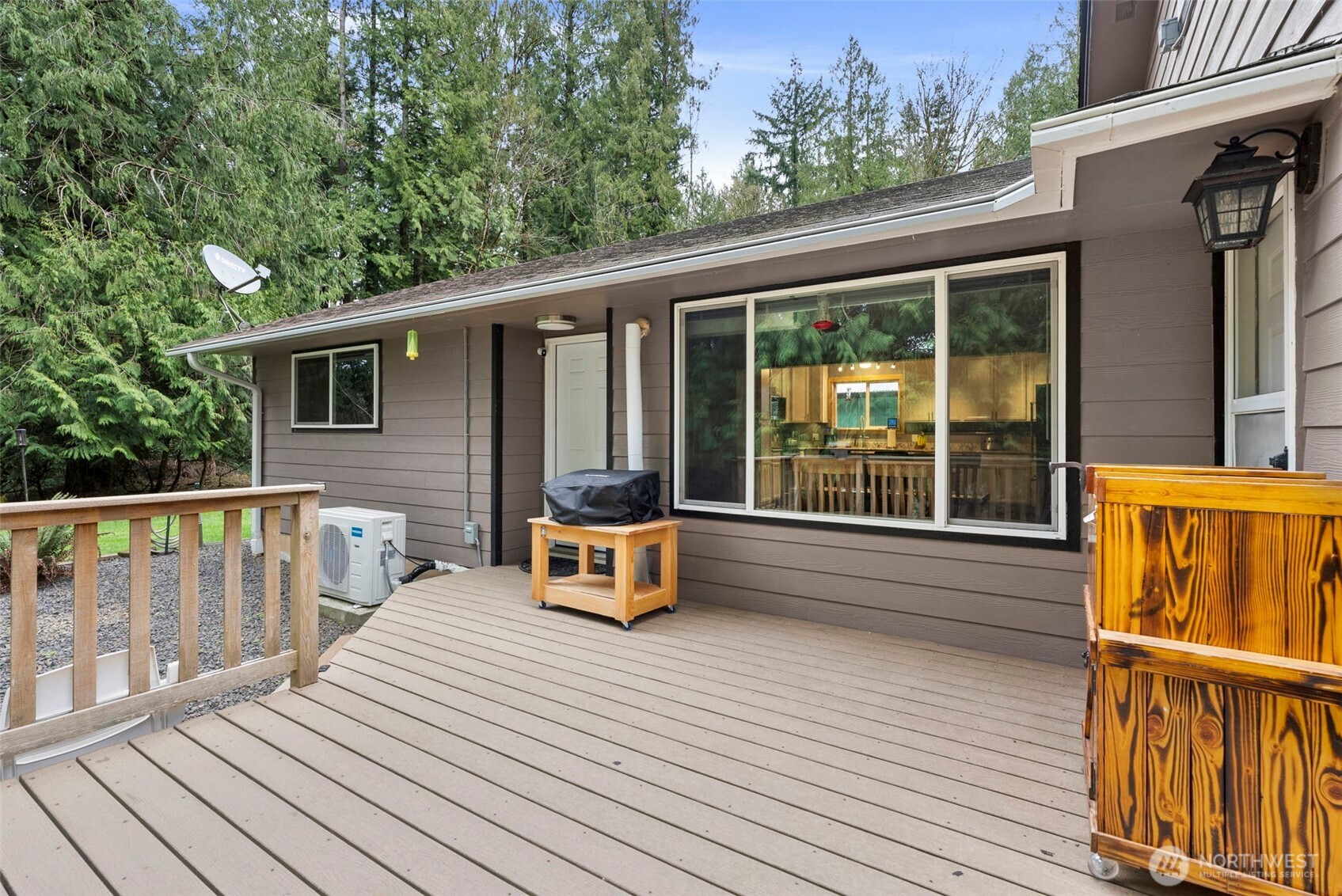 2434 Salzer Valley Road Centralia, WA 98531 - Photo 10 of 39 a view of a house with wooden deck and furniture
