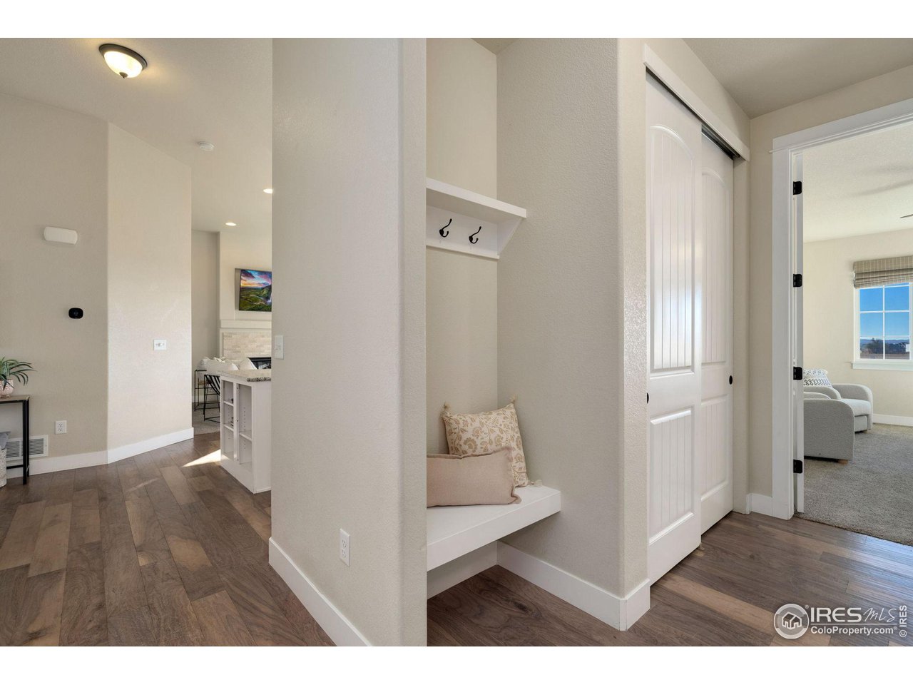 985 Mount Andrew Drive Severance, CO 80550 - Photo 14 of 25 a view of hallway with wooden floor