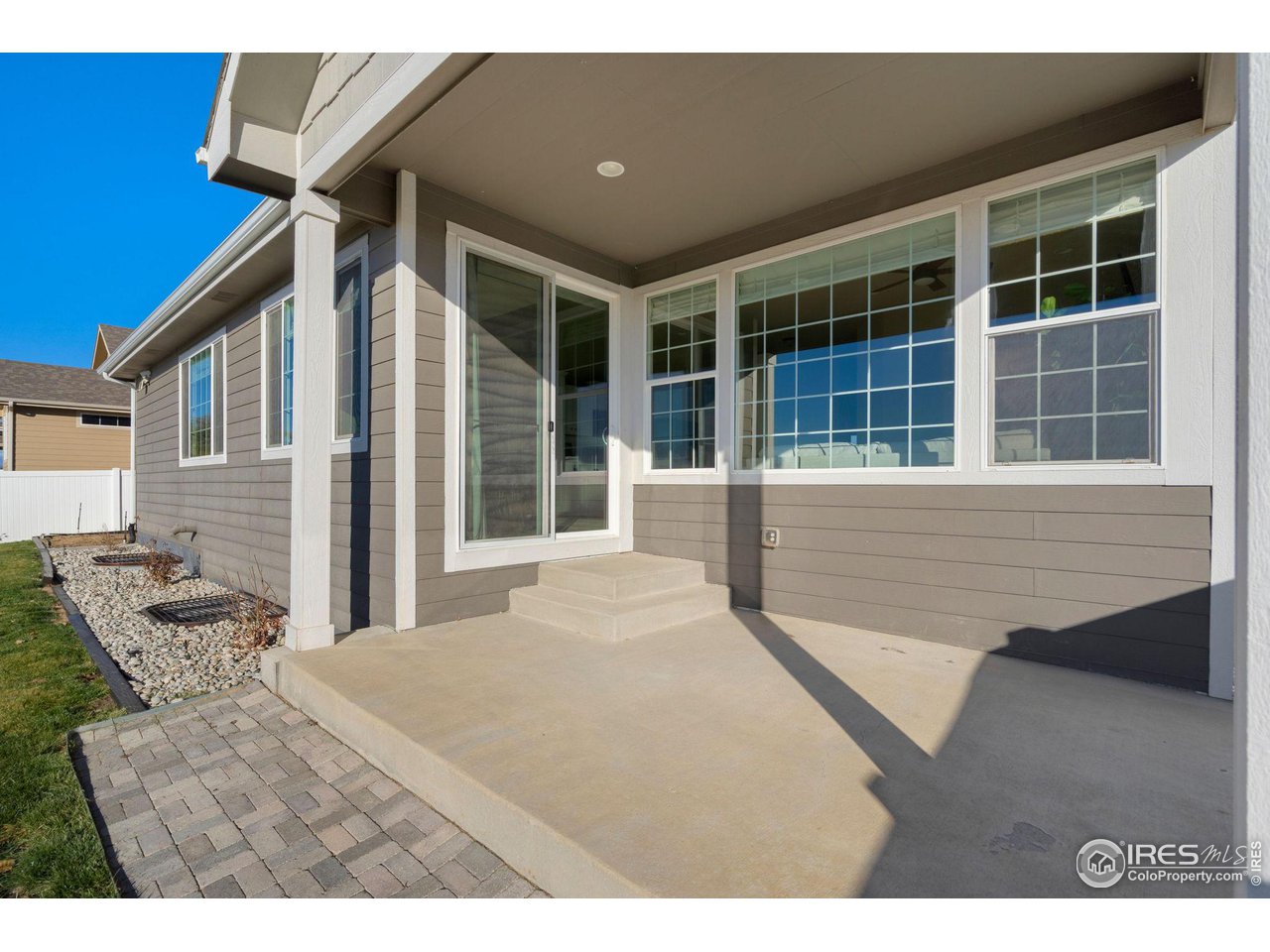 985 Mount Andrew Drive Severance, CO 80550 - Photo 23 of 25 a view of a house with backyard and windows