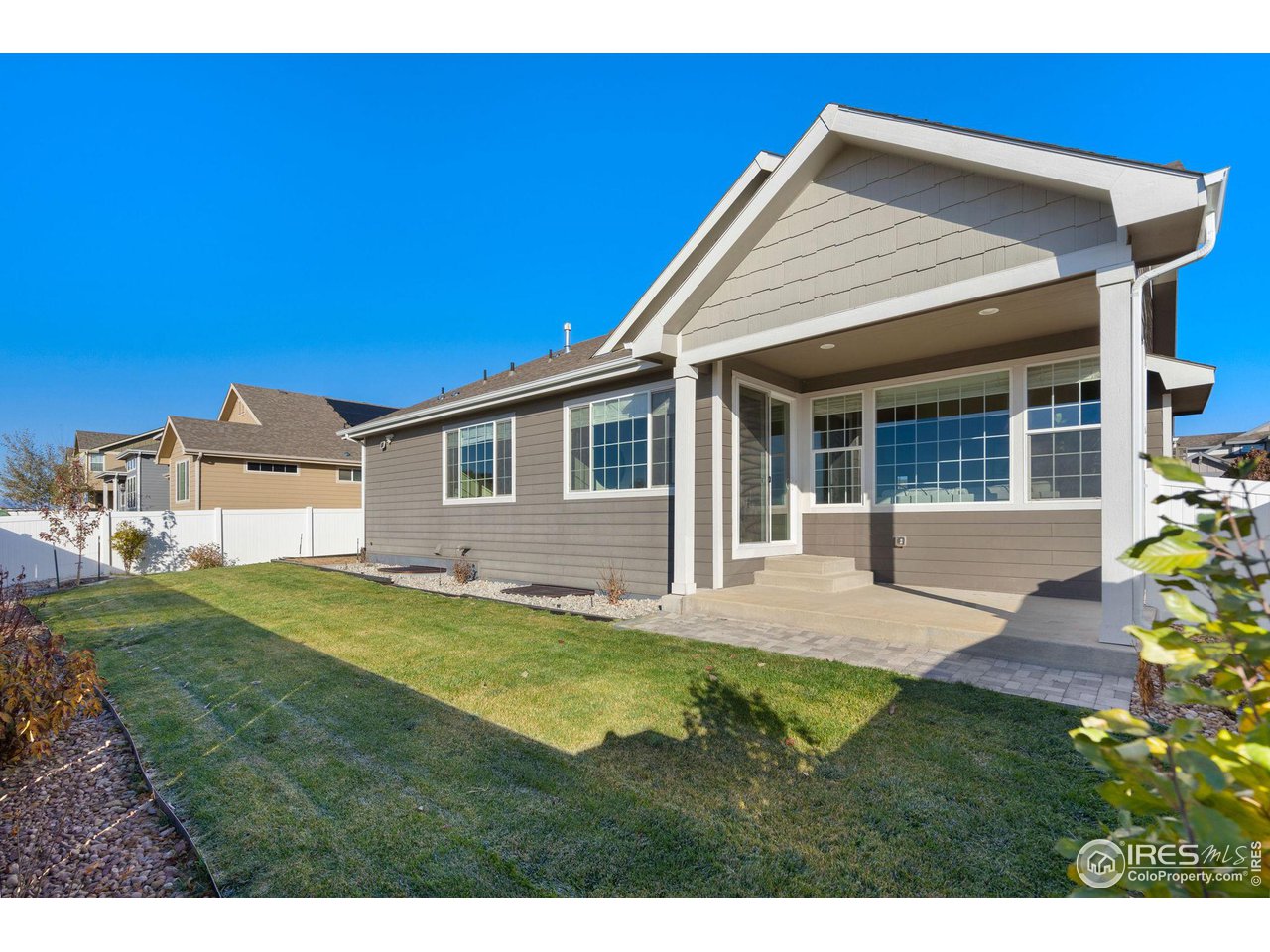 985 Mount Andrew Drive Severance, CO 80550 - Photo 24 of 25 a view of a house with a yard