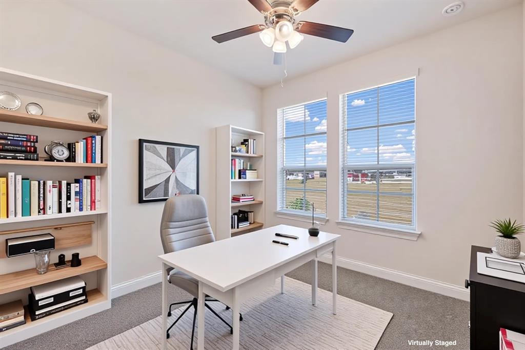 4518 Community Court Plano, TX 75024 - Photo 13 of 32 a workspace with furniture window and wooden floor