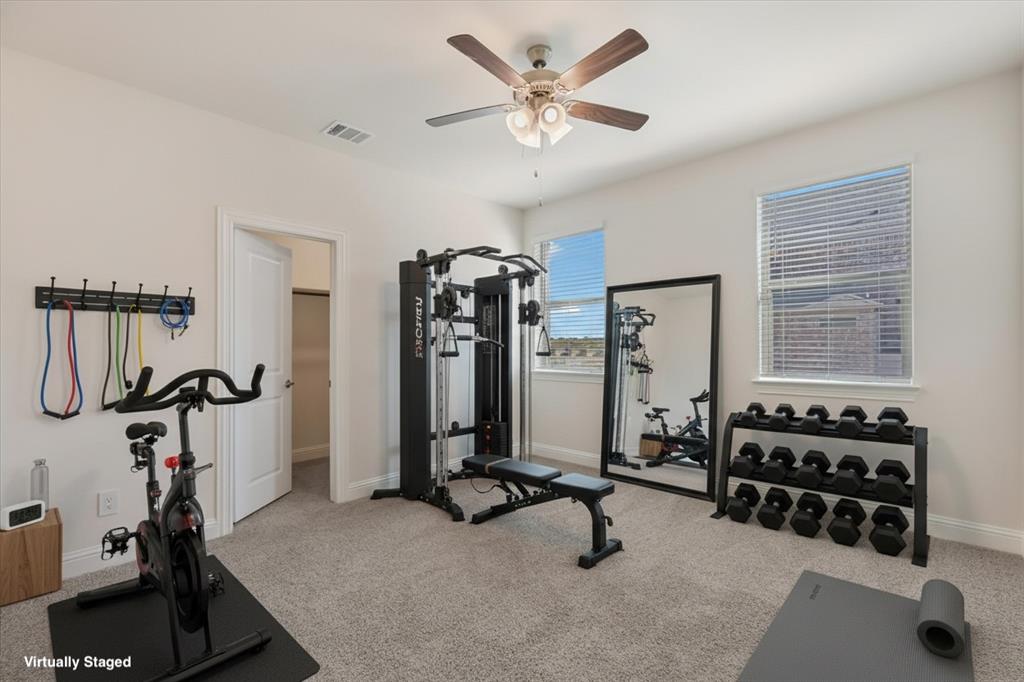 4518 Community Court Plano, TX 75024 - Photo 25 of 32 a view of a room with gym equipment