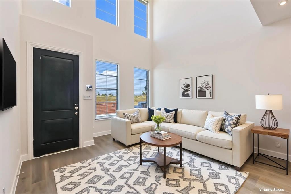 4518 Community Court Plano, TX 75024 - Photo 30 of 32 a living room with furniture and a rug