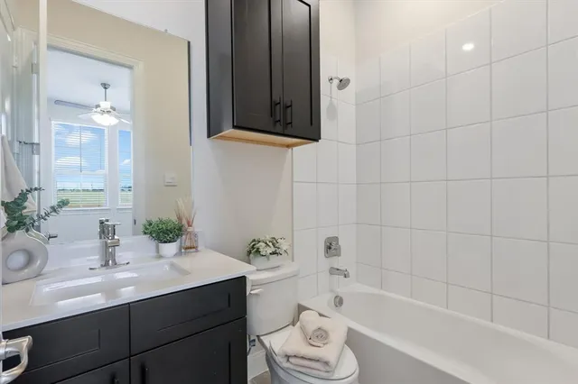 a bathroom with a sink a mirror and a shower