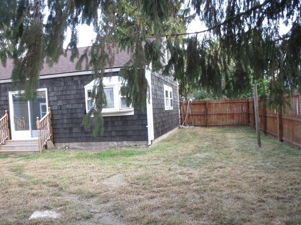 62 Cuff Avenue Springfield, MA 01104 - Photo 26 of 30 a view of backyard and tree