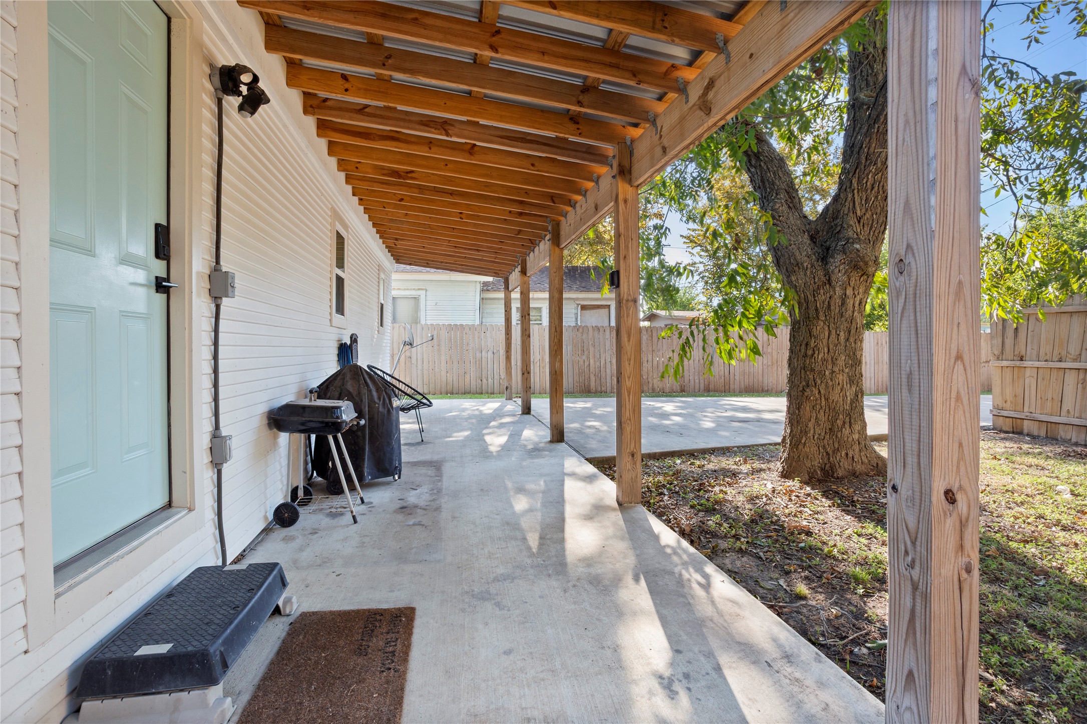 427 West 1st Street Freeport, TX 77541 - Photo 16 of 21 a view of a porch with furniture and a yard