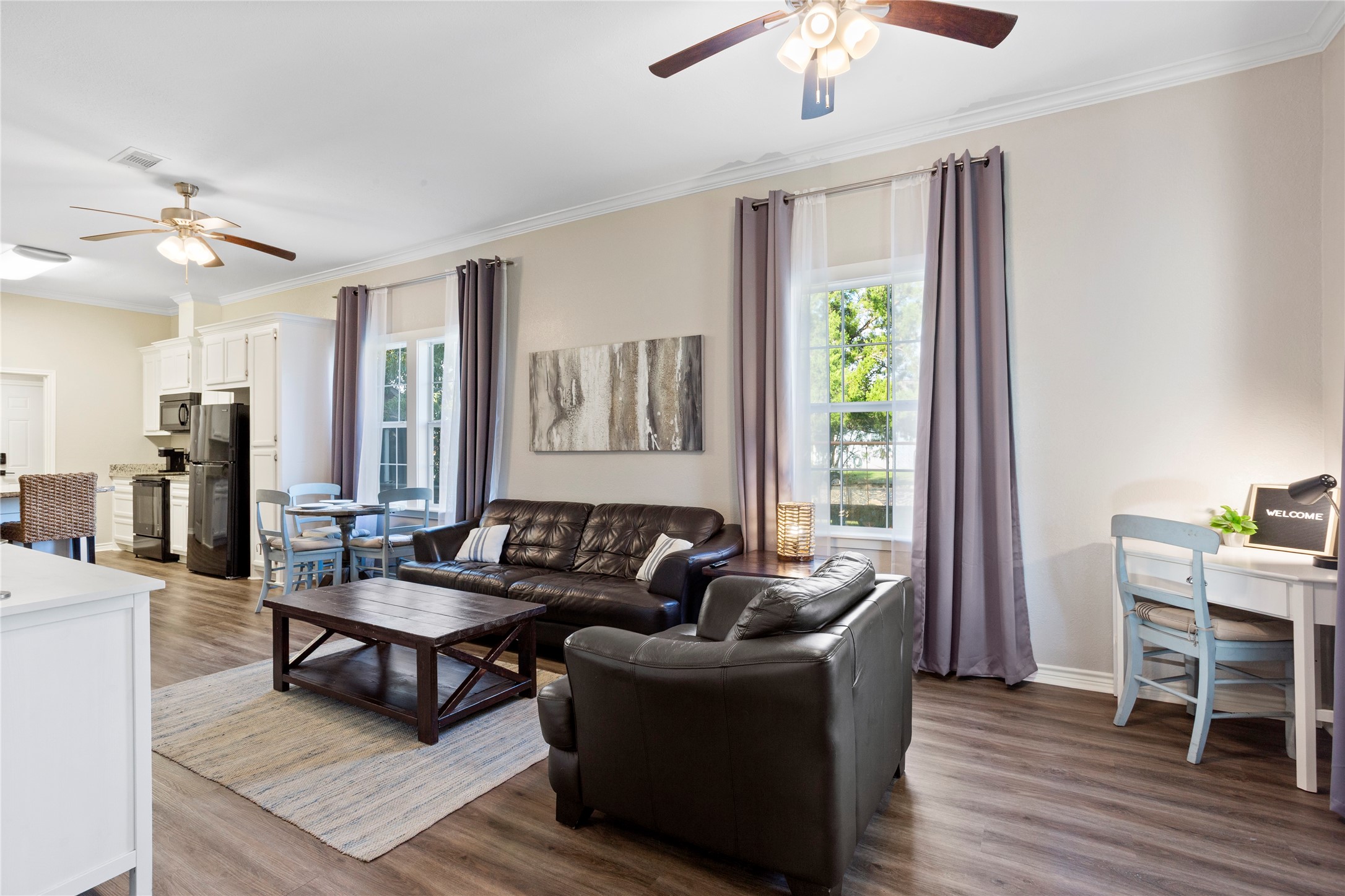 427 West 1st Street Freeport, TX 77541 - Photo 2 of 21 a living room with furniture and a wooden floor