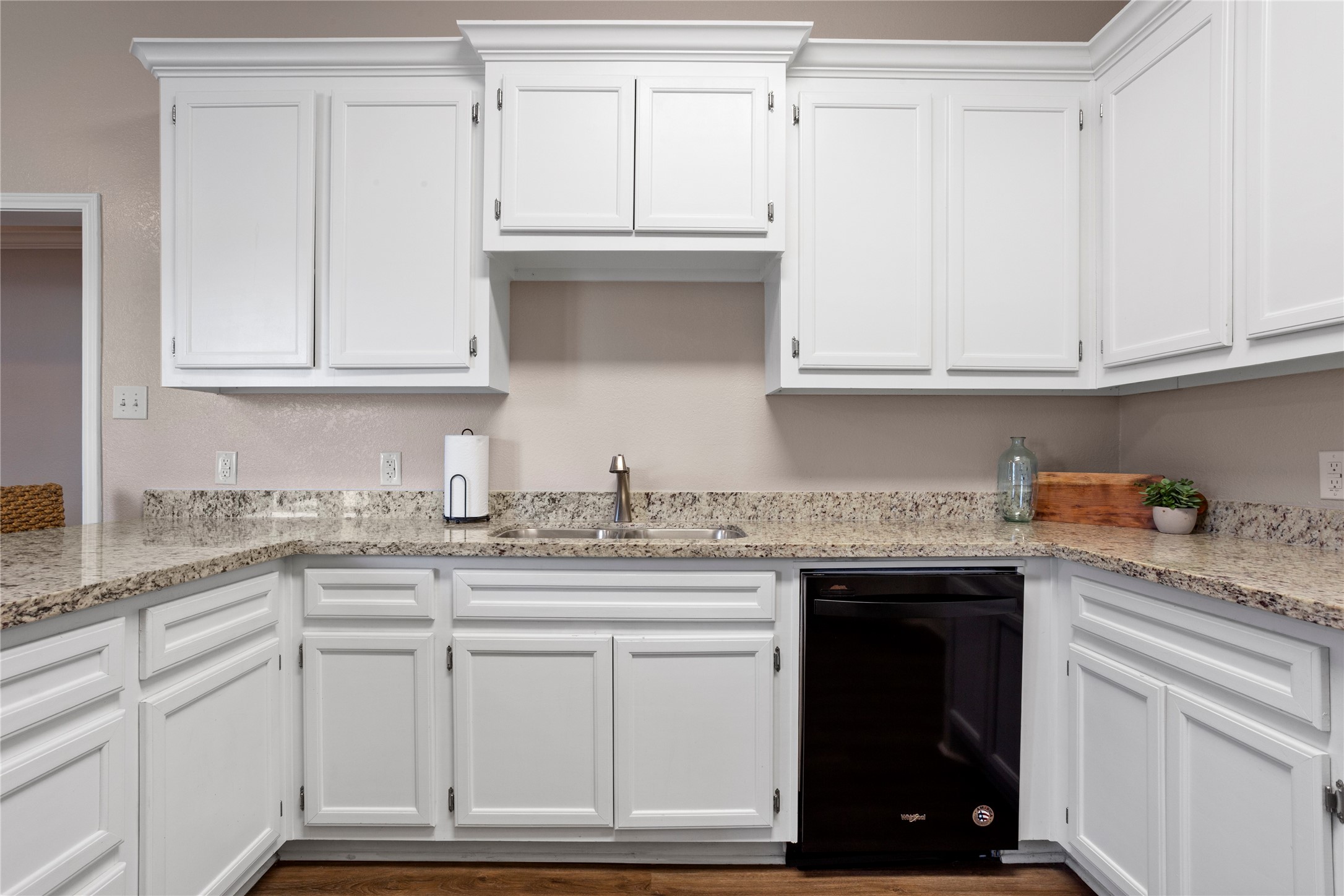 427 West 1st Street Freeport, TX 77541 - Photo 7 of 21 a kitchen with granite countertop white cabinets and a sink