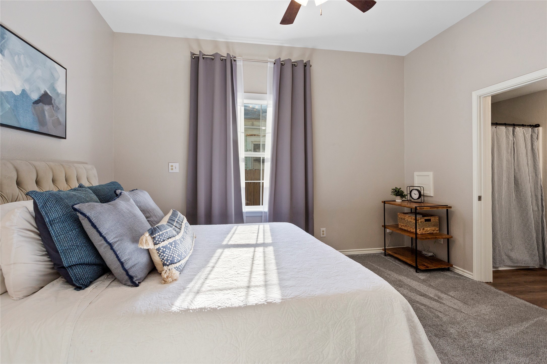 427 West 1st Street Freeport, TX 77541 - Photo 9 of 21 a bedroom with a bed and a window